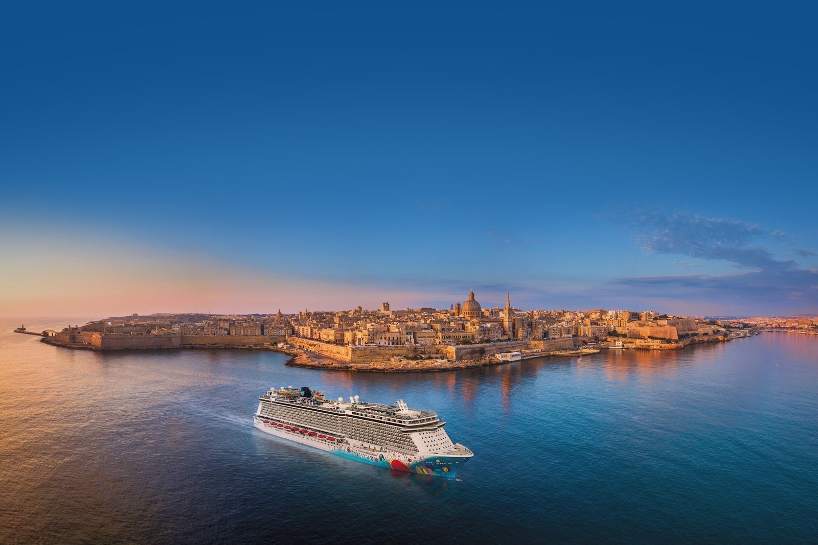 A cruise ship sailing off the coast of Valetta, Malta