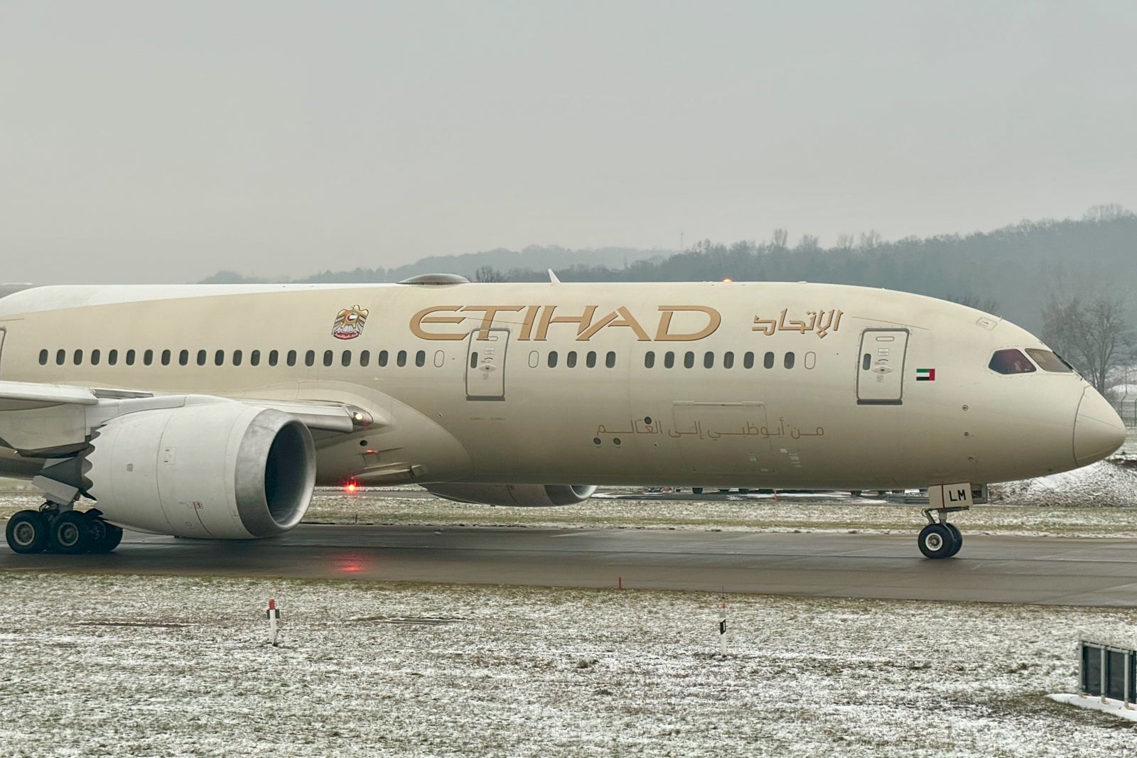 Amex Platinum vs. Business Platinum: Which card is best? An Etihad jet