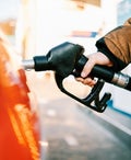 Person pumping gas