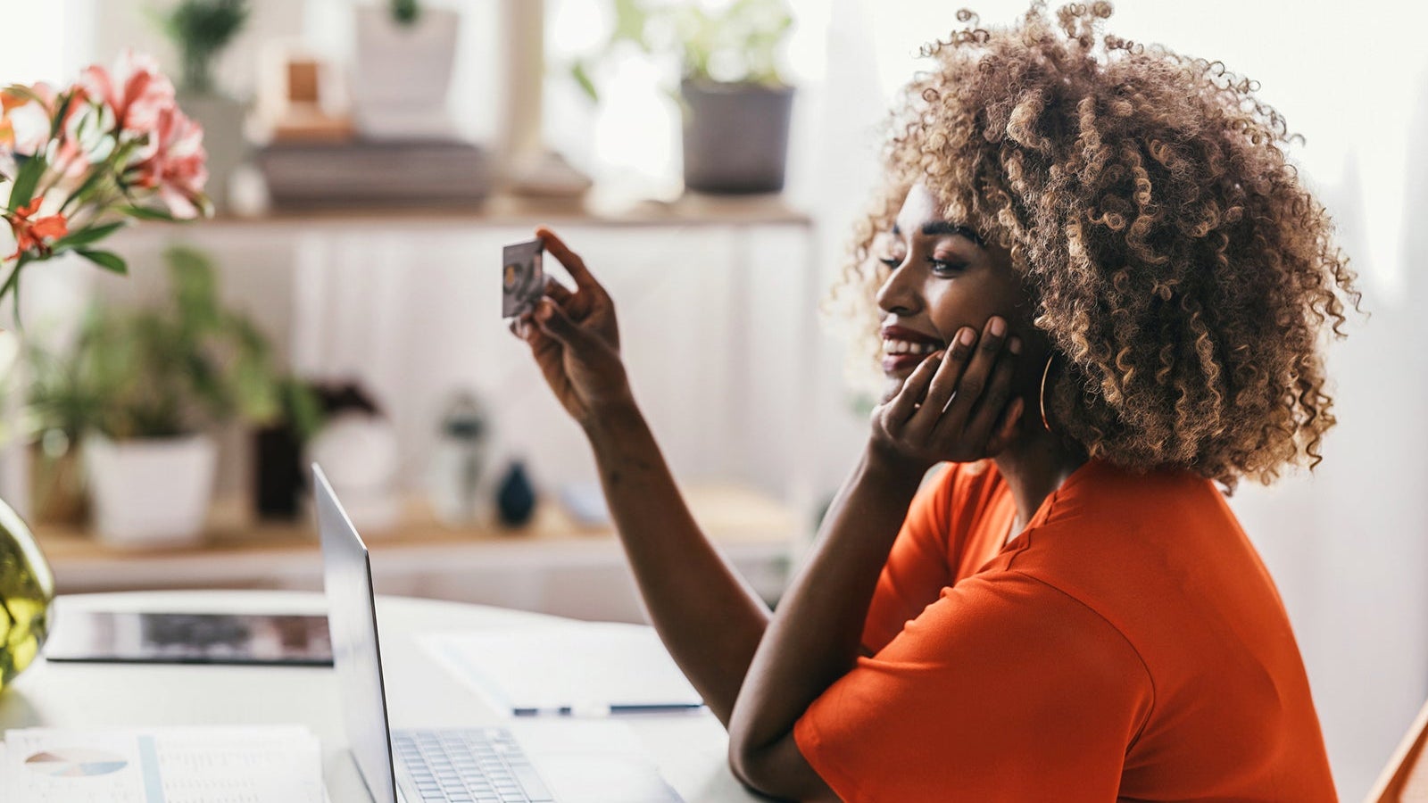 Happy African American Woman Shopping Online, Using her Credit Card