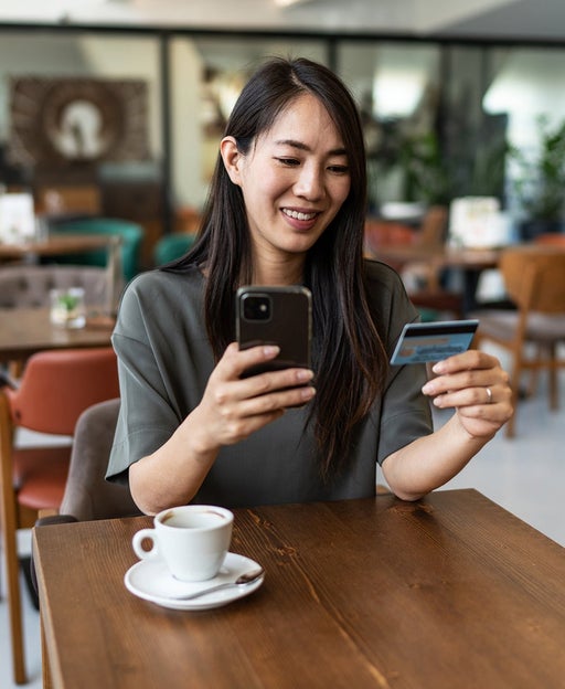 Woman enrolling in hotel elite status