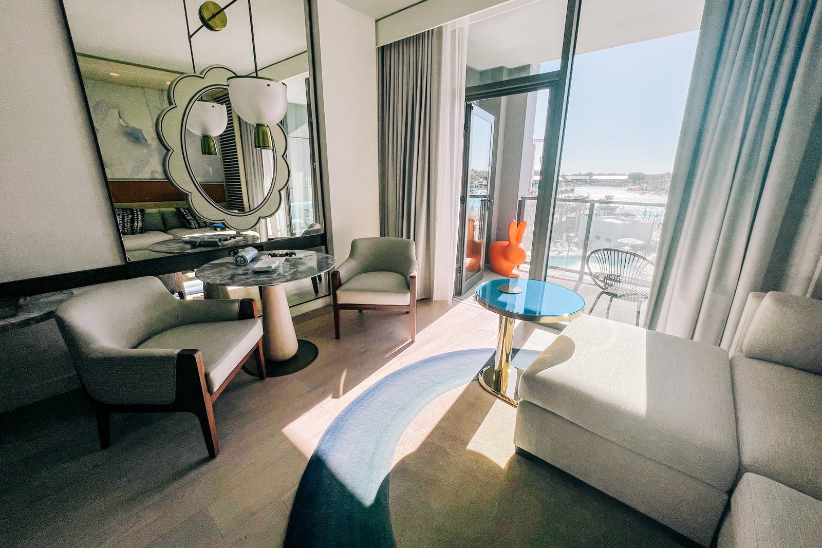 hotel room living area with balcony