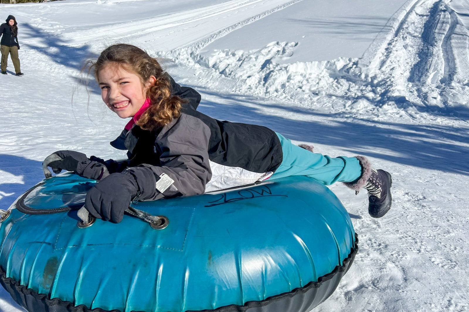child at Brian Head tubing