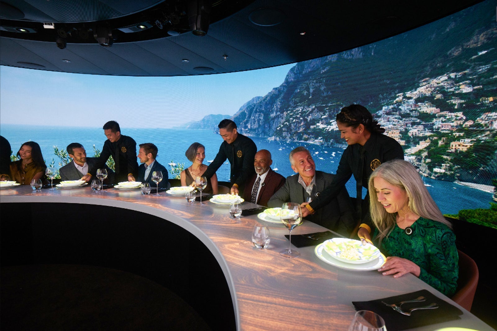 Waiters serving guests at Princess Cruises' 360 Dining Experience