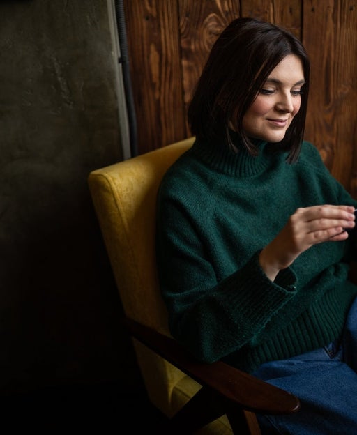 woman holding credit card