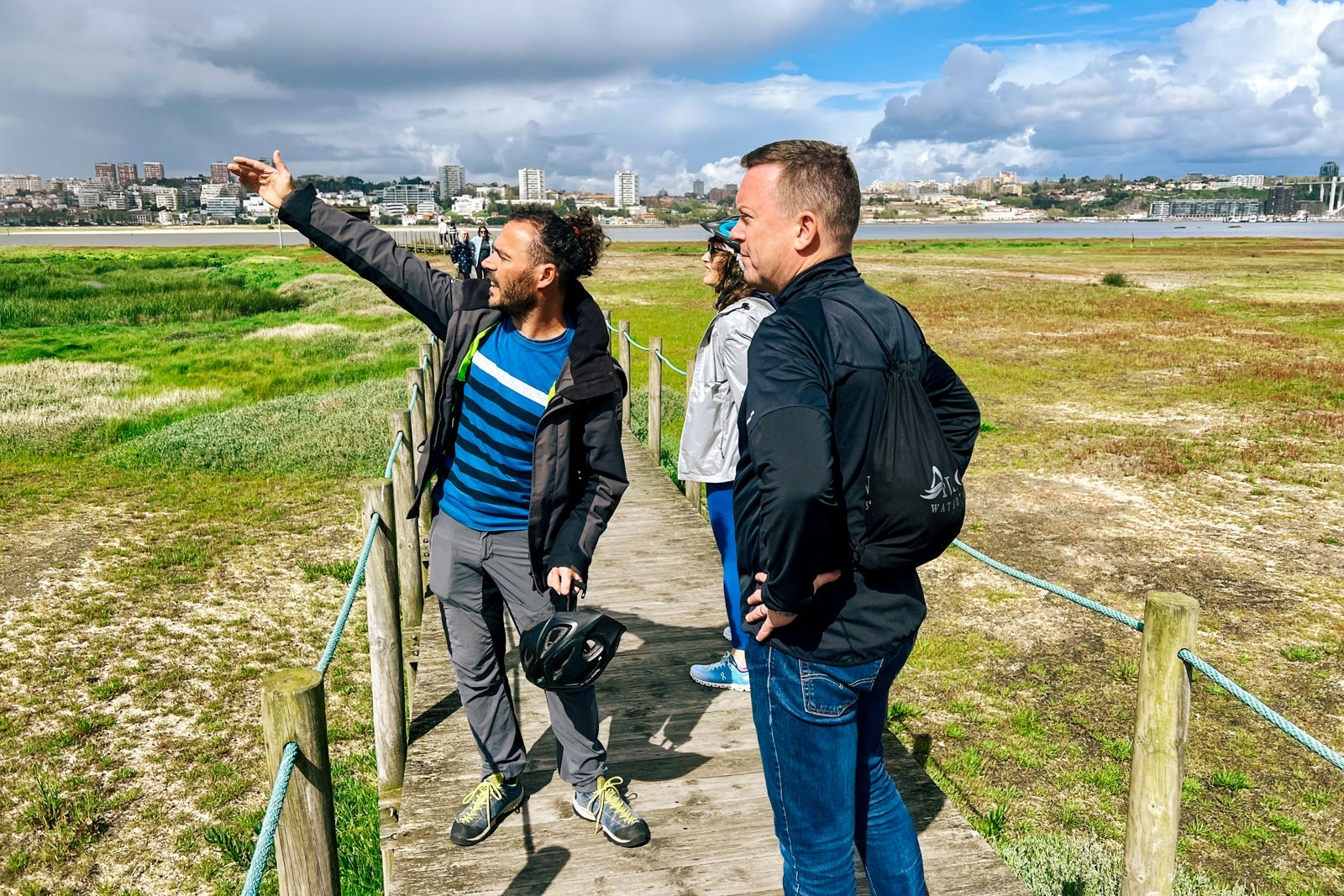 A guide points out birds