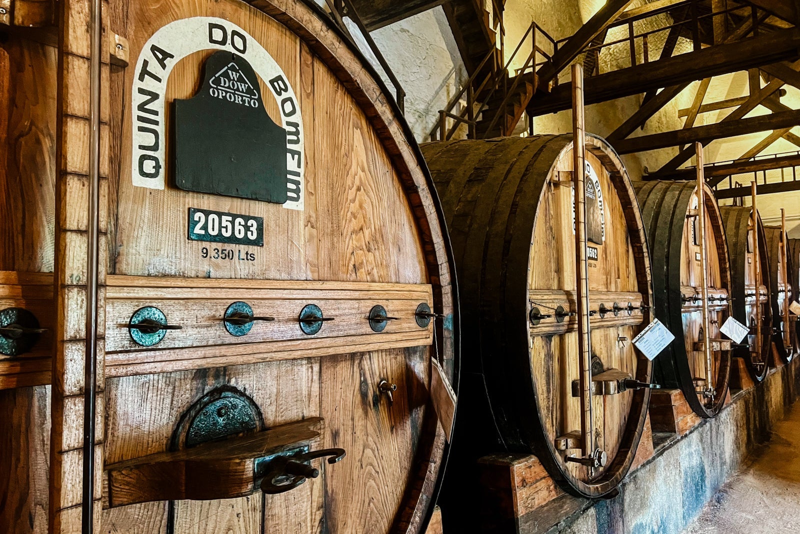 Barrels of aging Port wine at a winery in Portugal