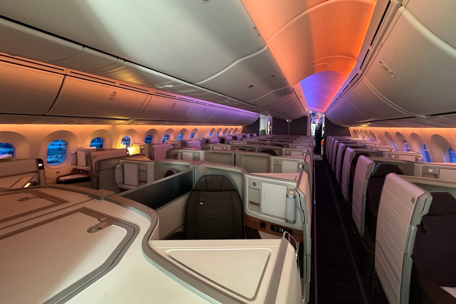 a view down the aisle of an airplane