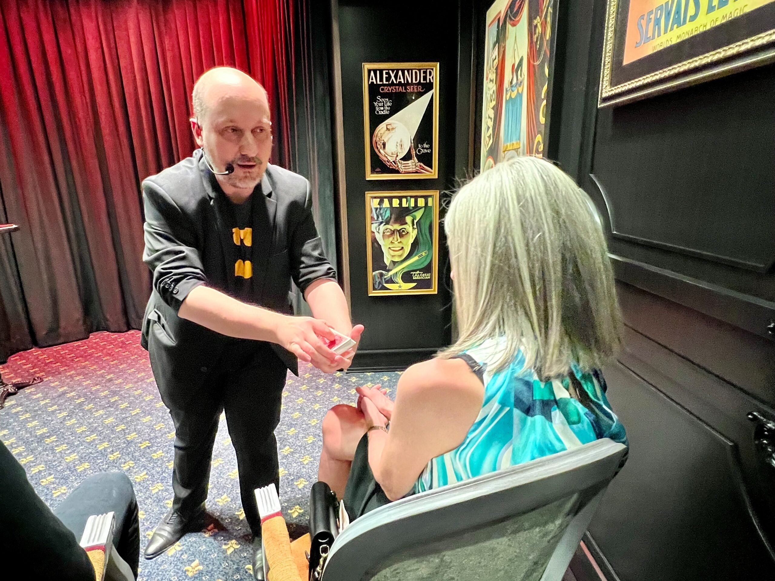 Magician Woody Aragon performs at Spellbound