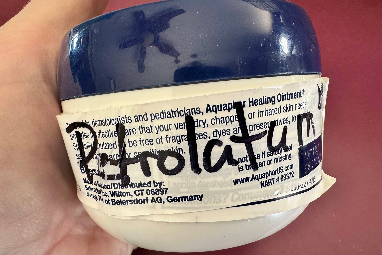Aquaphor jar marked with the word "petrolatum"