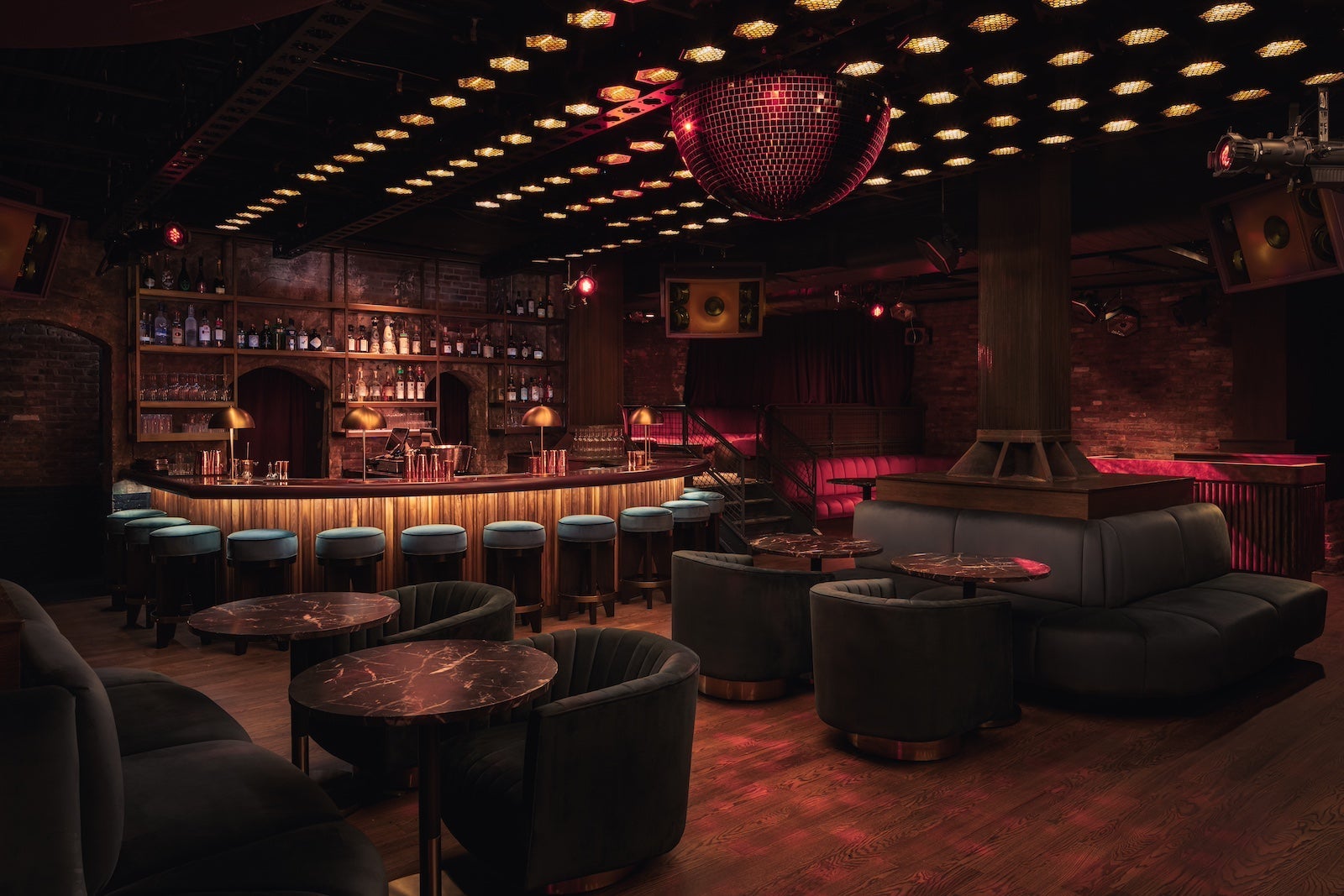 A dimly lit lounge of a Hyatt 