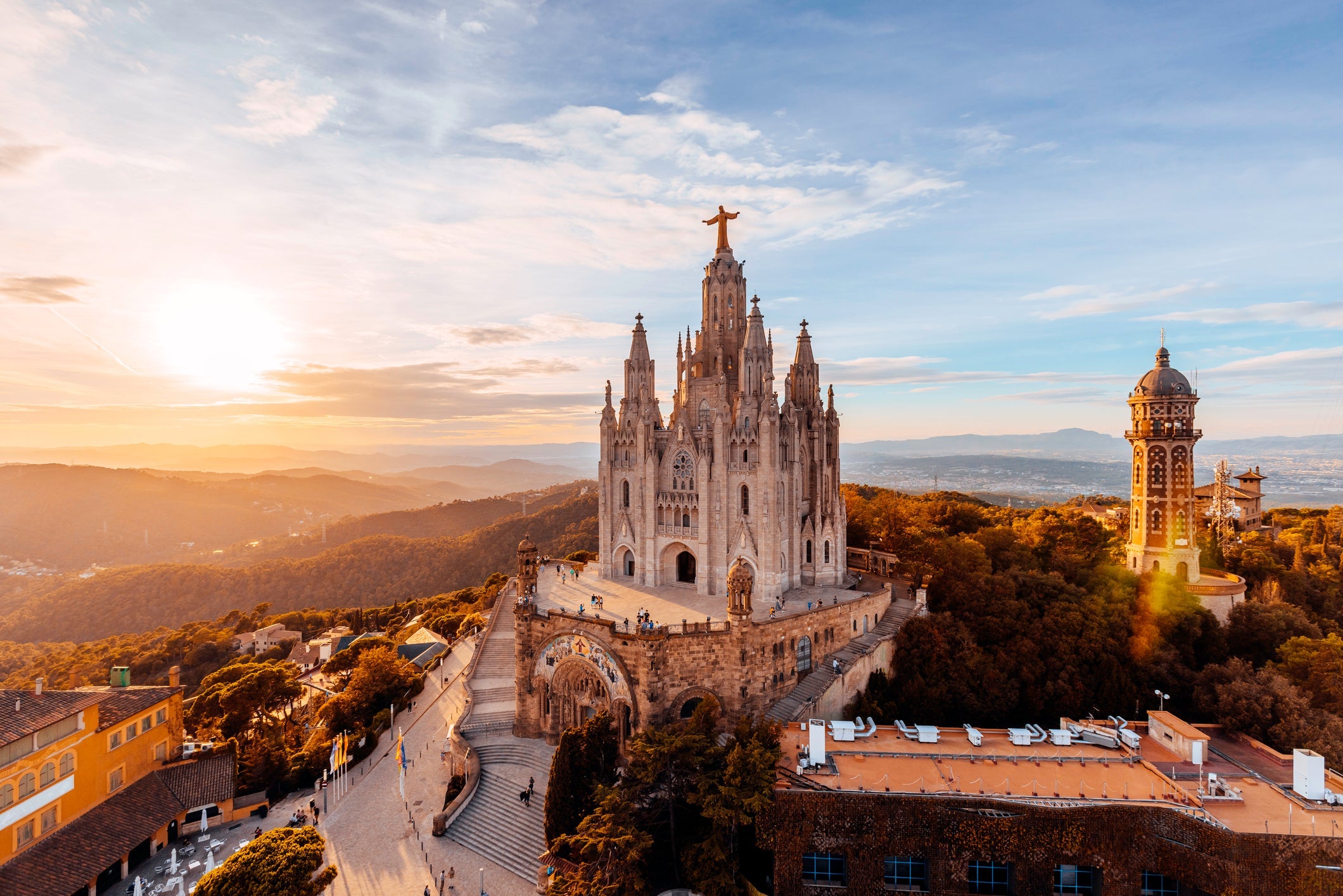 Tibidabo mountain and Sagrat Cor church at sunset, Barcelona, Spain.
