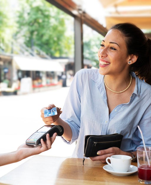 Woman making card payment.