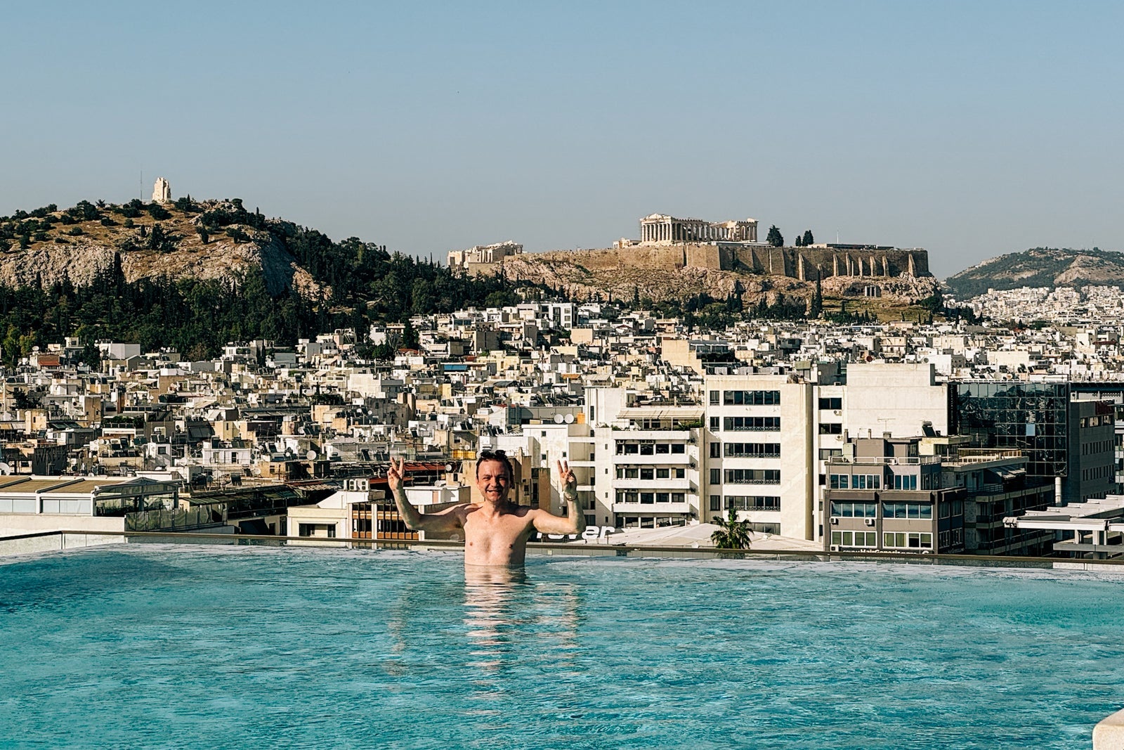 Tanner Saunders in a pool in Greece
