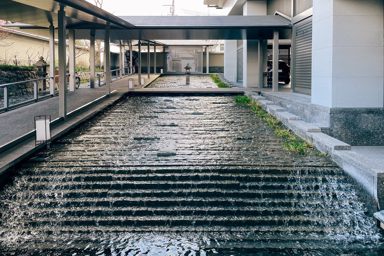 Cascading water over steps at The Ritz-Carlton, Kyoto in Japan