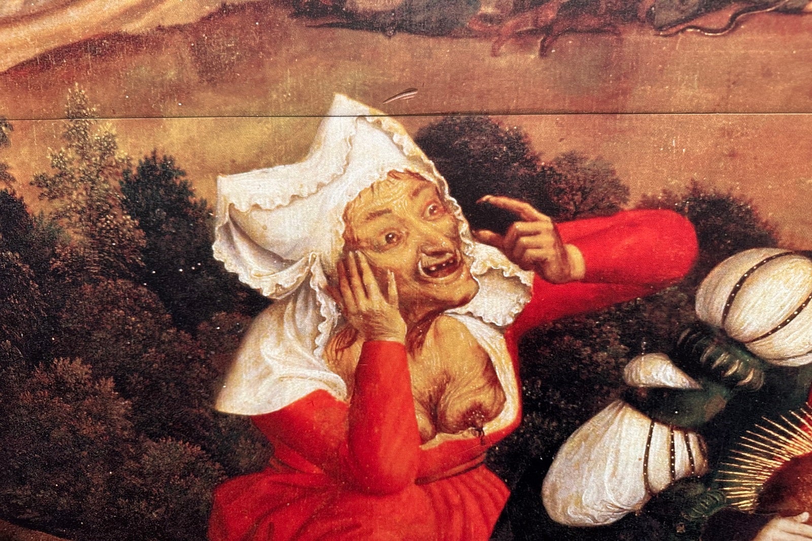 A print of a medieval painting of a crone on the Carnival Firenze