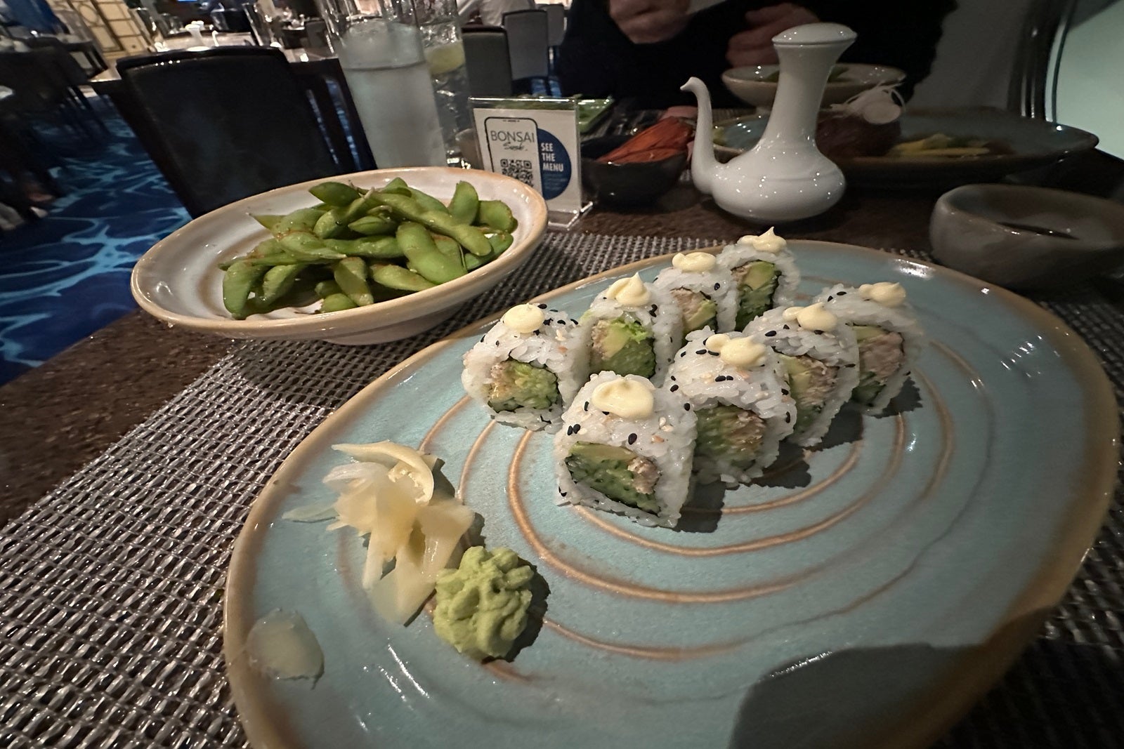 Sushi on a teal plate
