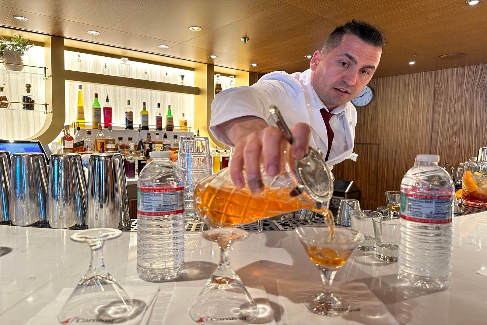A bartender teaches a mixology class