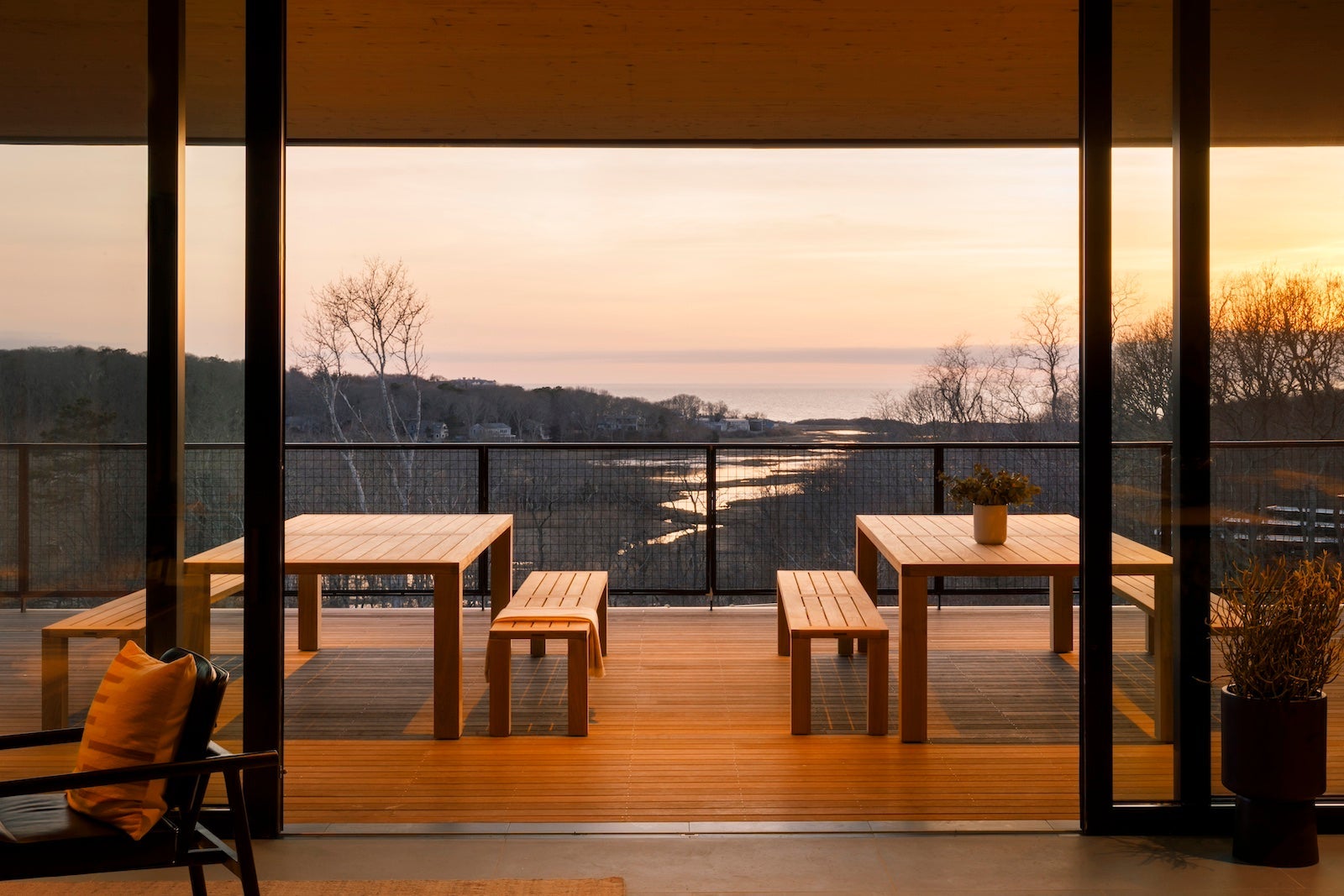 The view of AutoCamp Cape Cod's clubhouse down to the ocean. 