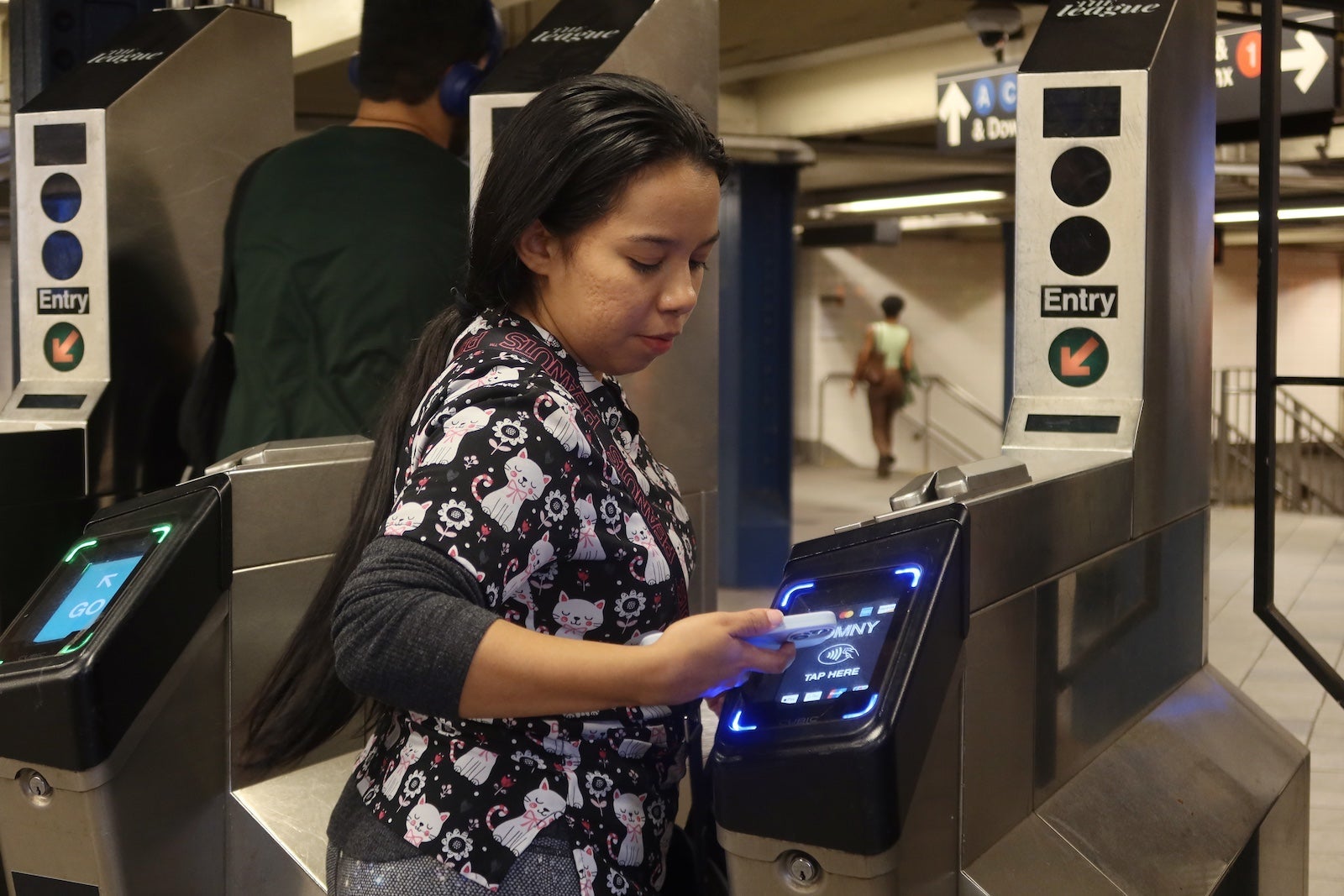 A person using the Columbus Circle Subway Station in New York City