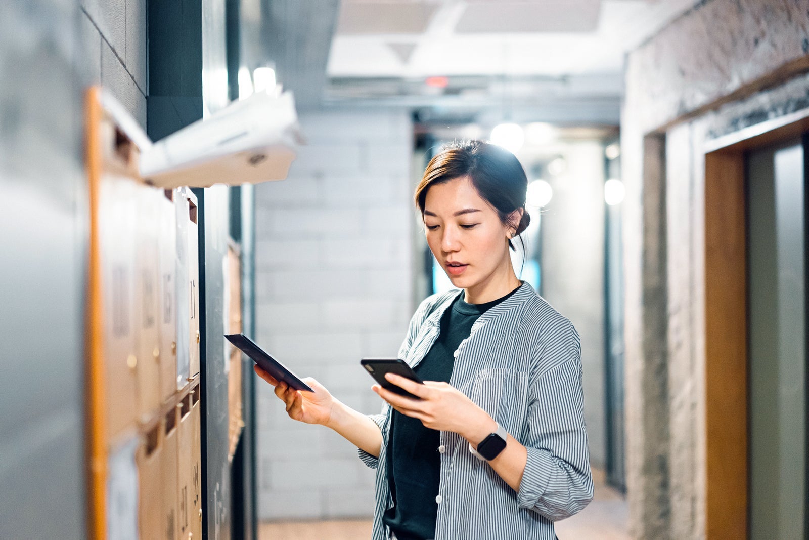 woman checking mail