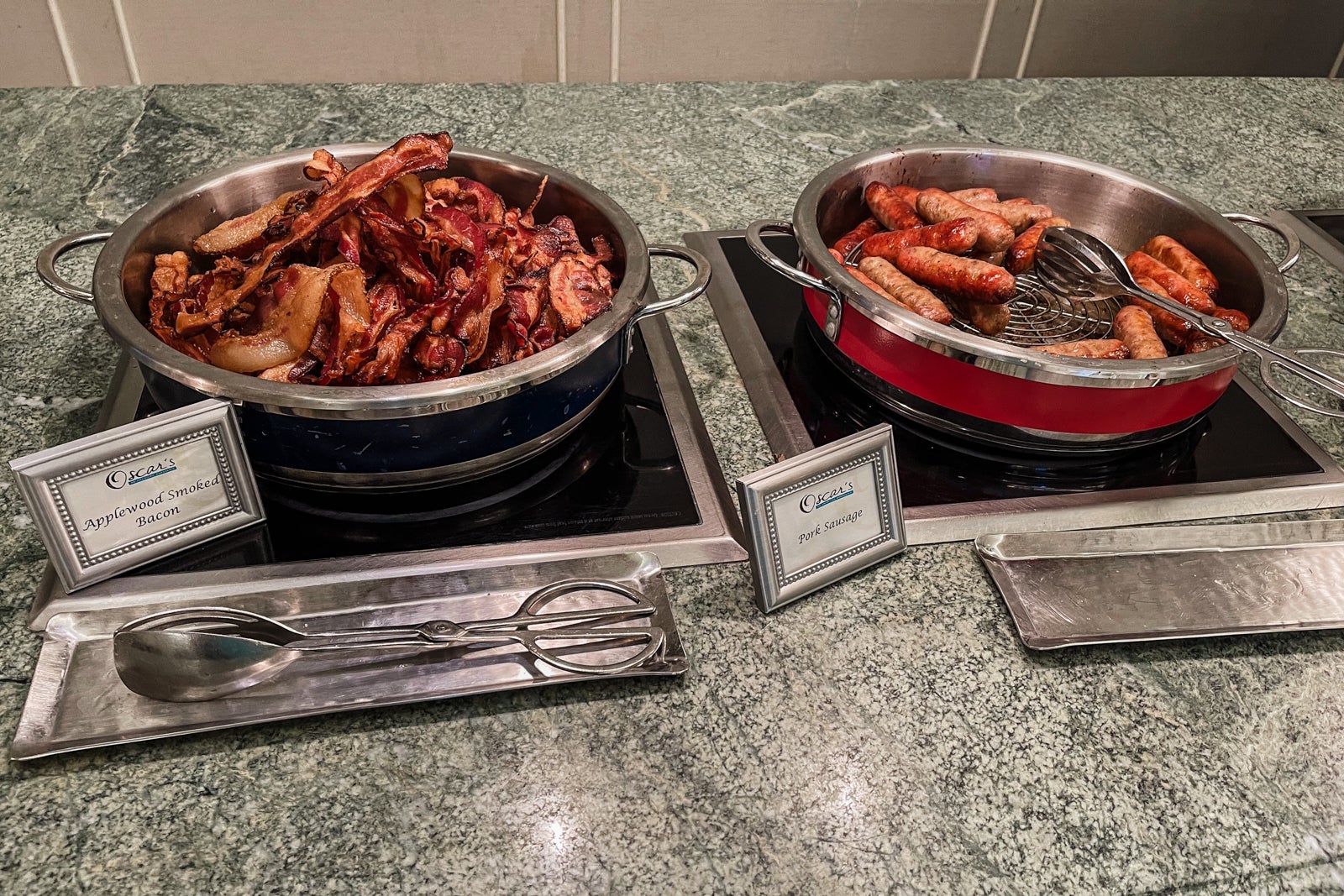 Bacon and sausage on the breakfast buffet at Oscar's - Waldorf Astoria Orlando