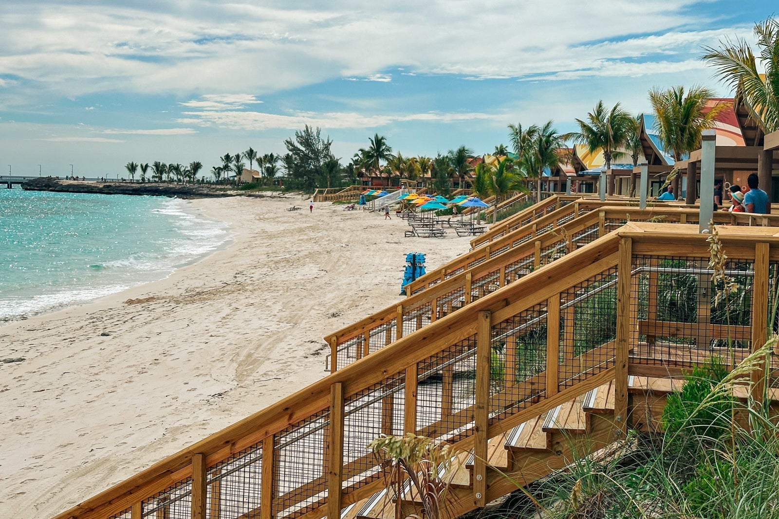 A set of boardwalk stairs descending to the beach