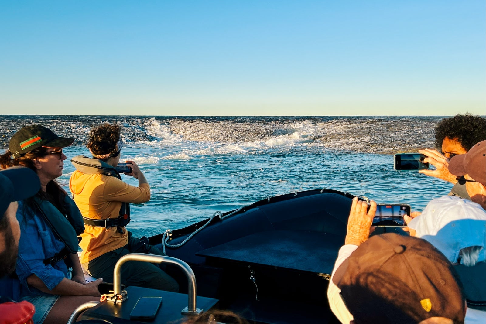 Seabourn Pursuit passengers view water rushing off Montgomery Reef