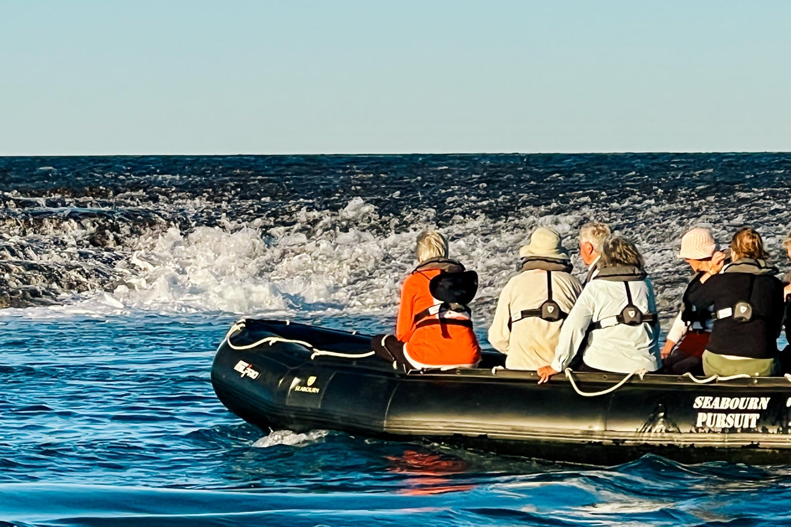 Seabourn Pursuit passengers view water rushing off Montgomery Reef
