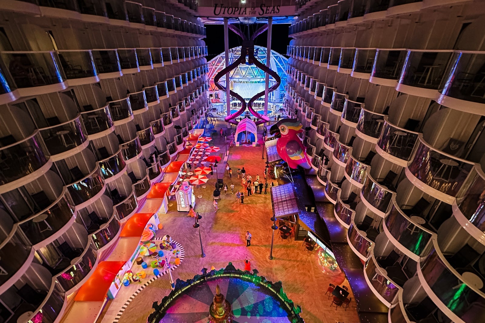 The Boardwalk neighborhood on a Royal Caribbean cruise ship from above at night
