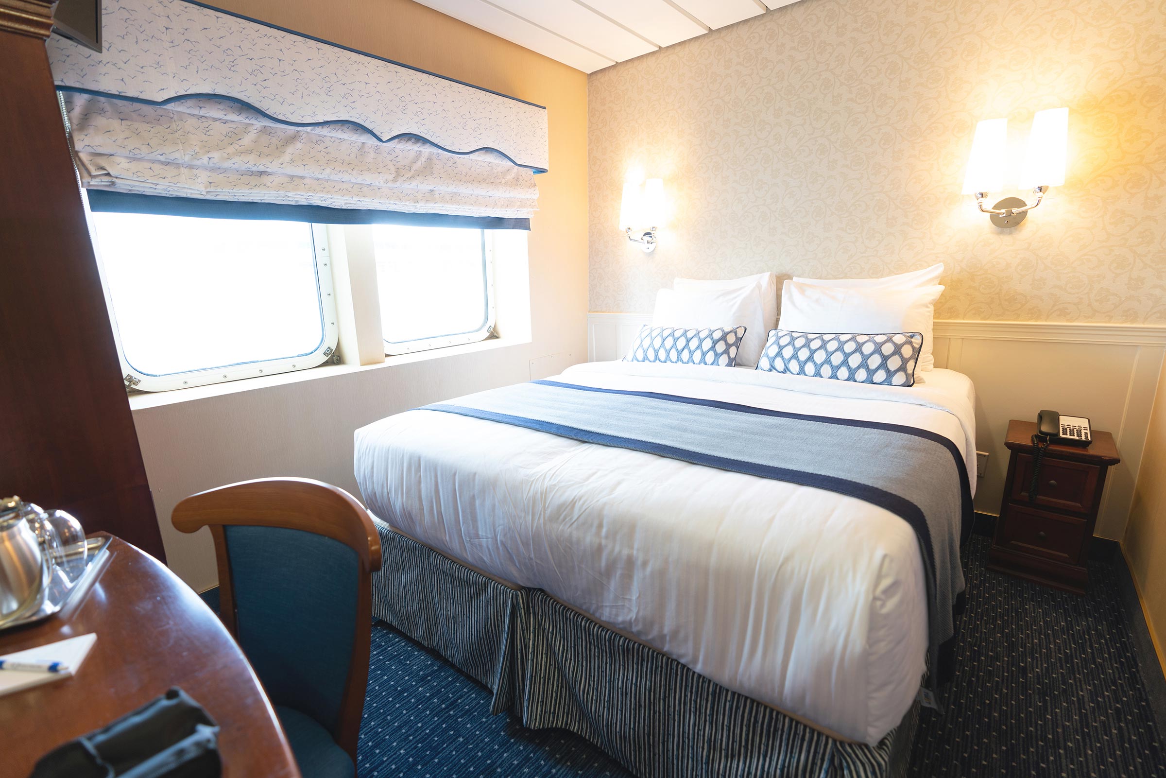 A cabin on a Victory Cruise Lines ship