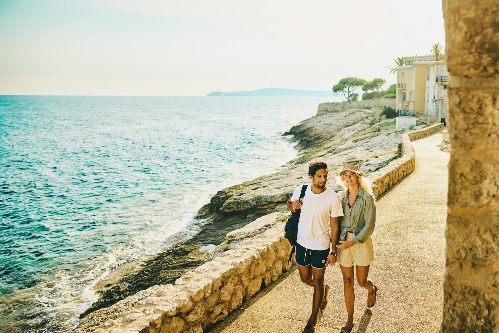 Young adult couple enjoying a hike along the coast of the Côte d'Azur in the south of France.