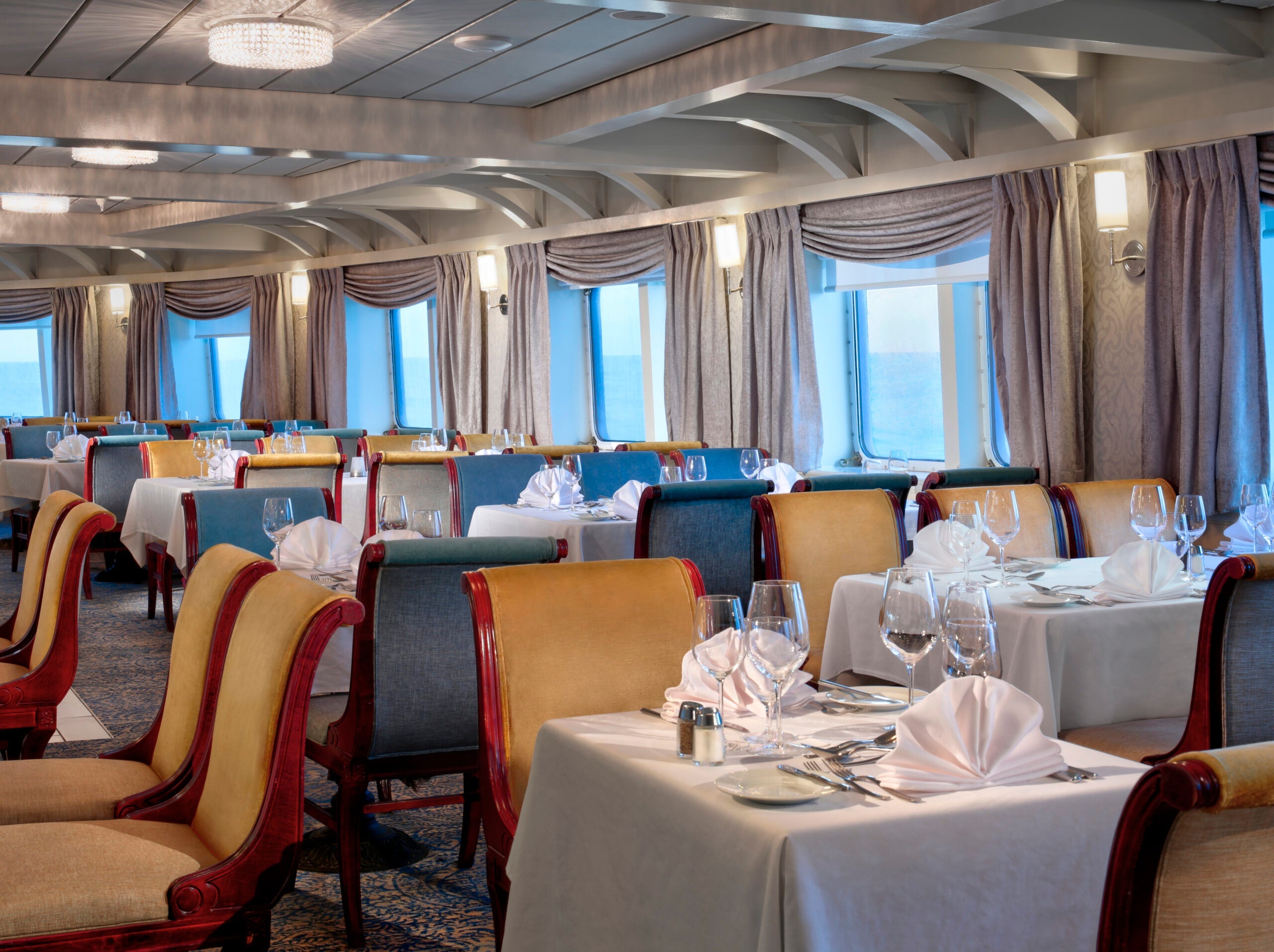 The Coastal Dining Room on Victory Cruise Lines ships