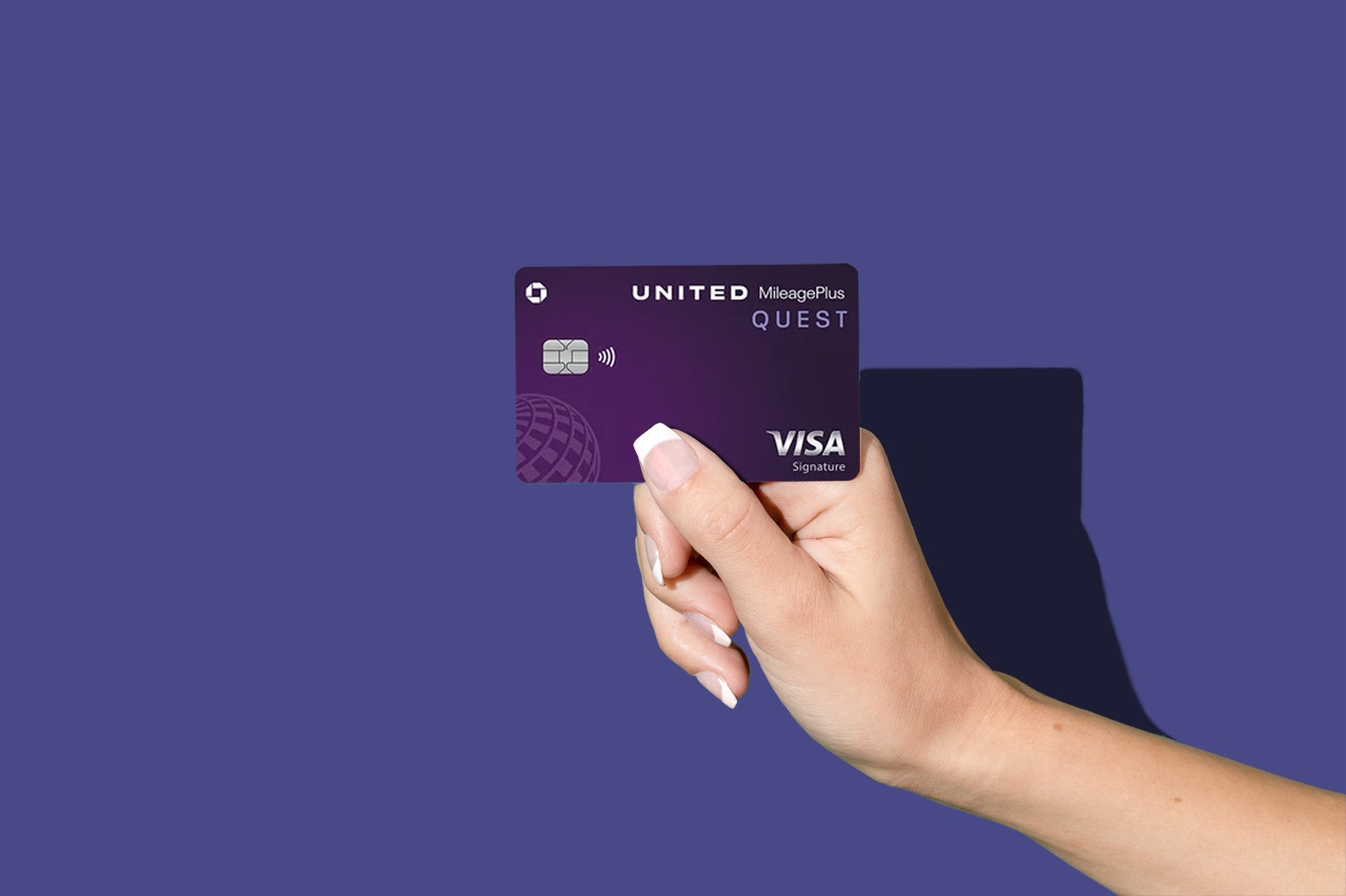 Hands holding credit cards
