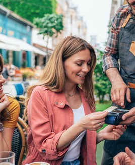 Woman paying with a credit card