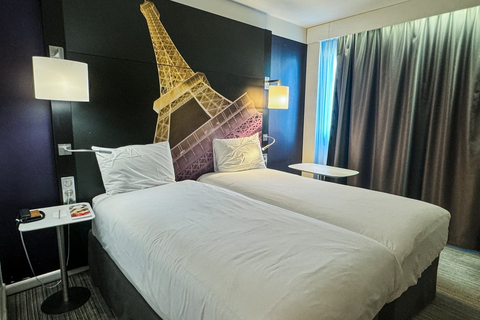 The beds at the Mercure Paris Centre Eiffel Tower Hotel
