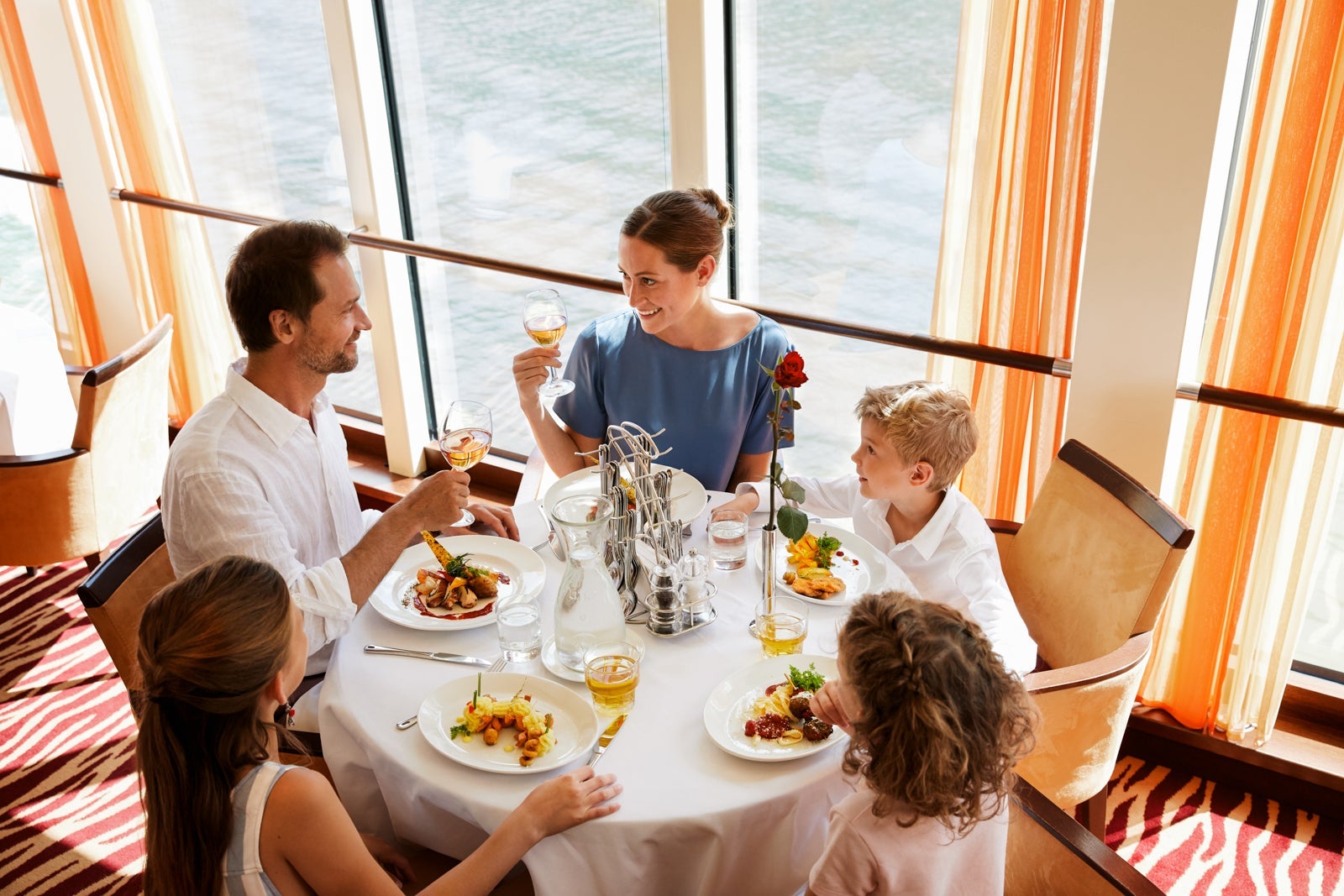 Family dining on river cruise