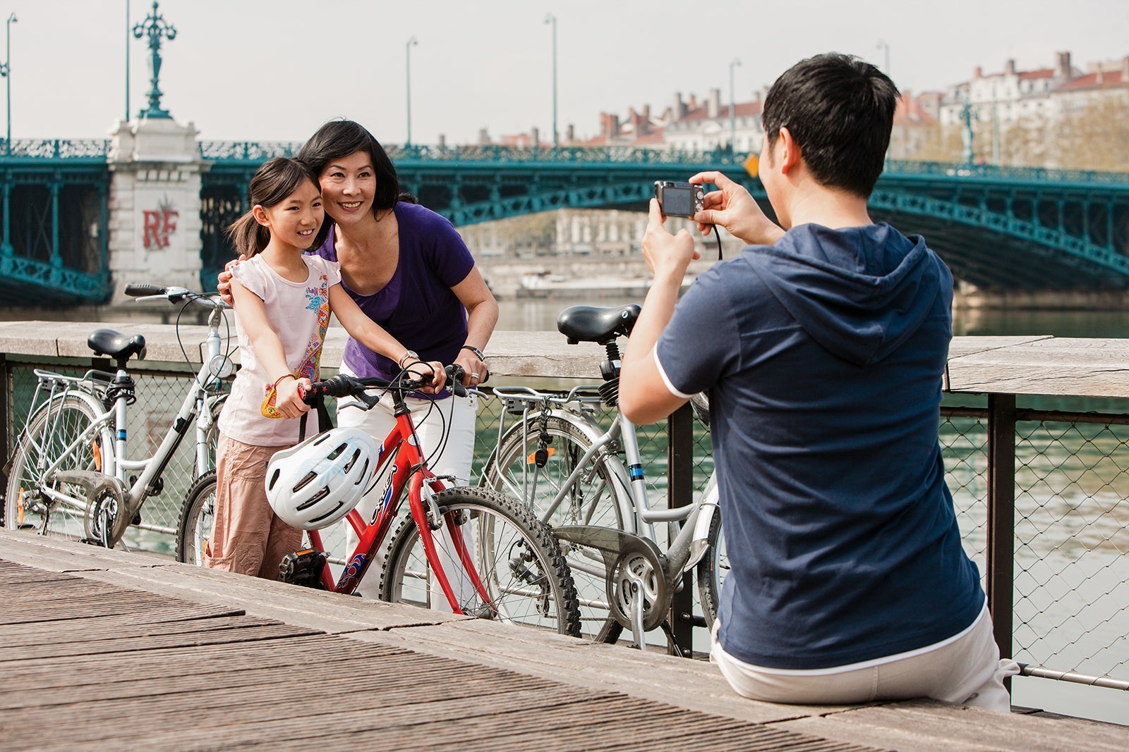 Family poses for photo during bike excursion