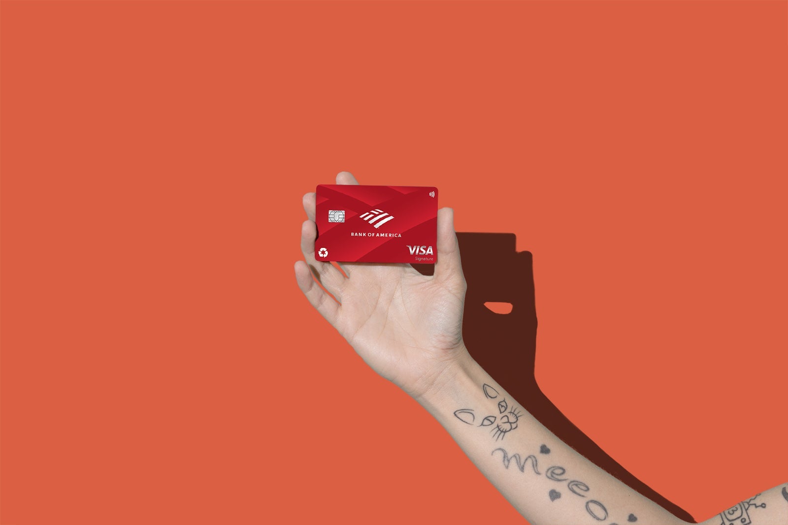 Hands holding credit cards