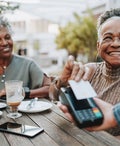 People paying bill with a credit card