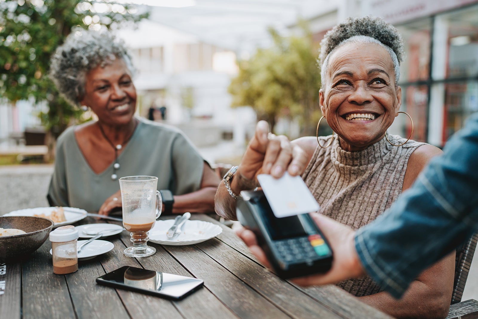 People paying bill with a credit card