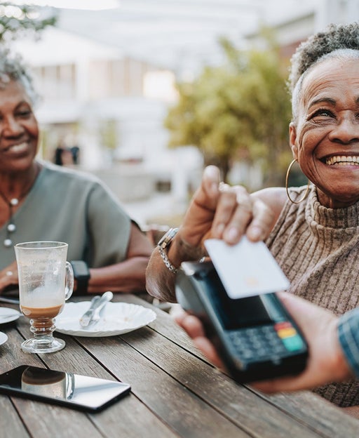 People paying bill with a credit card