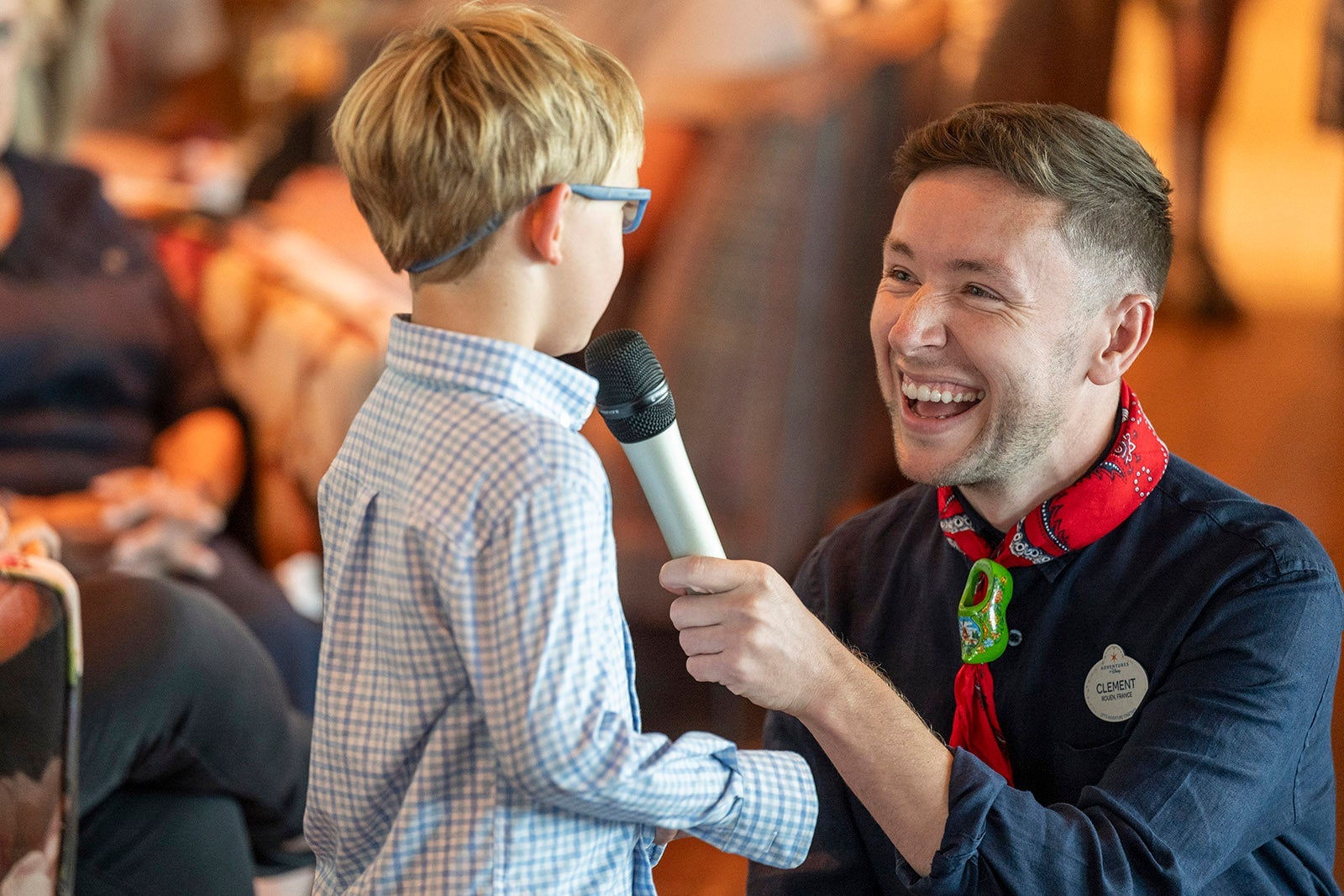 River cruise guide speaking to young boy