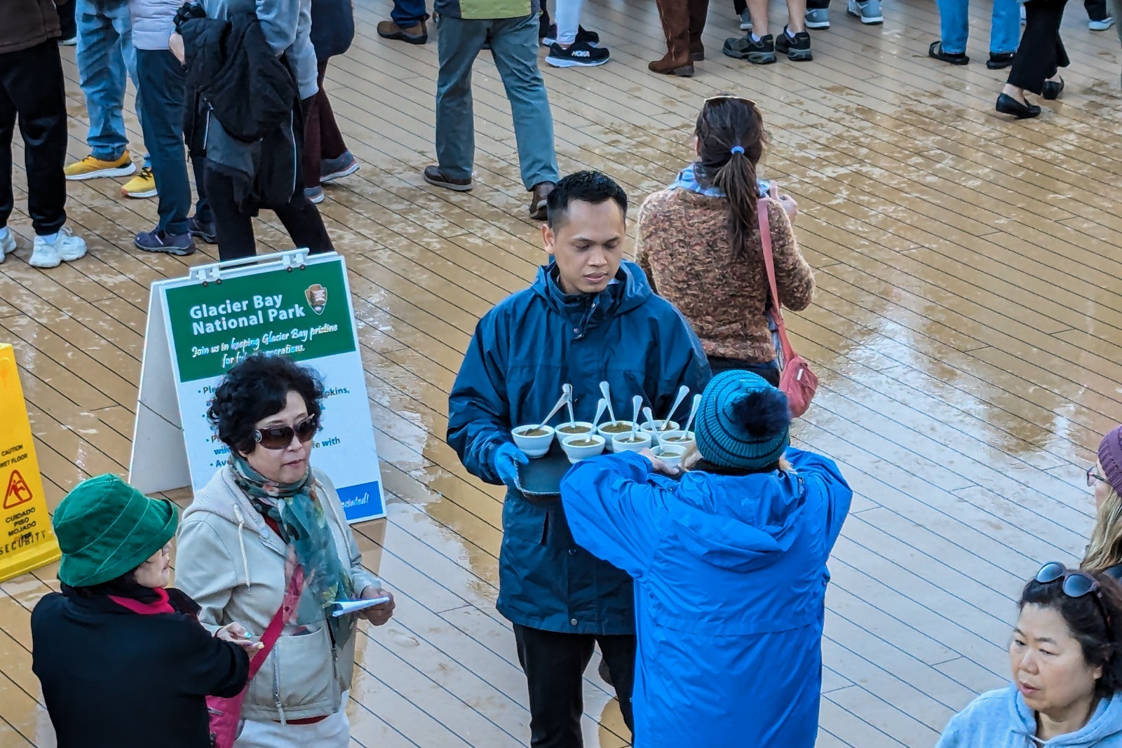 Crew serving pea soups to guests on cruise in Glacier Bay