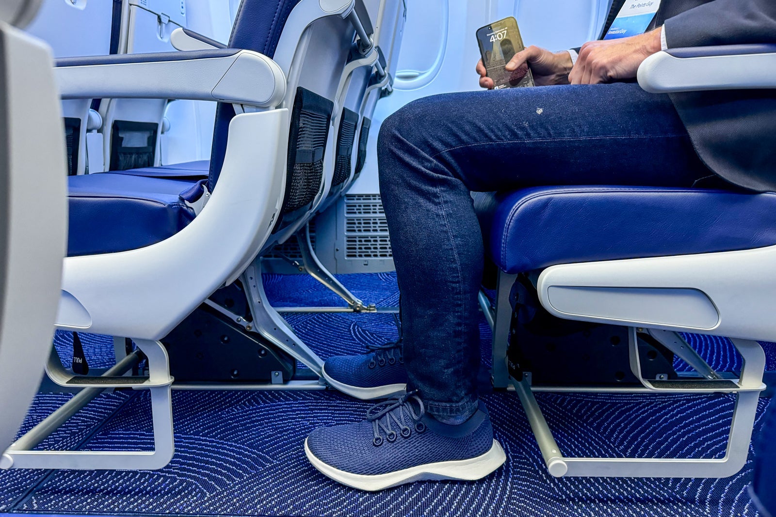 a reporter sitting in a Southwest Airlines seat