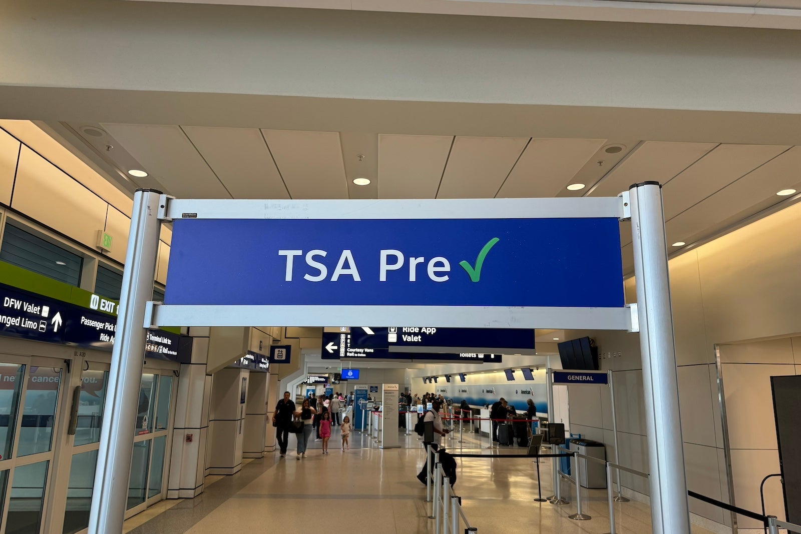 A TSA PreCheck entrance at Dallas Fort Worth International Airport (DFW) Terminal A. 