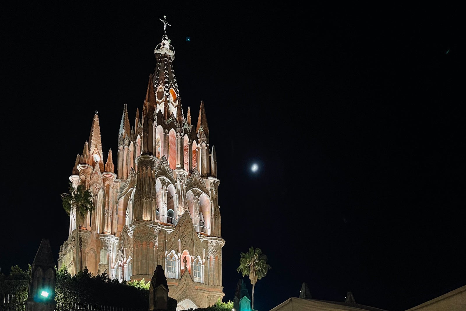 Church of San Miguel Arcangel, Mexico at night with the moon
