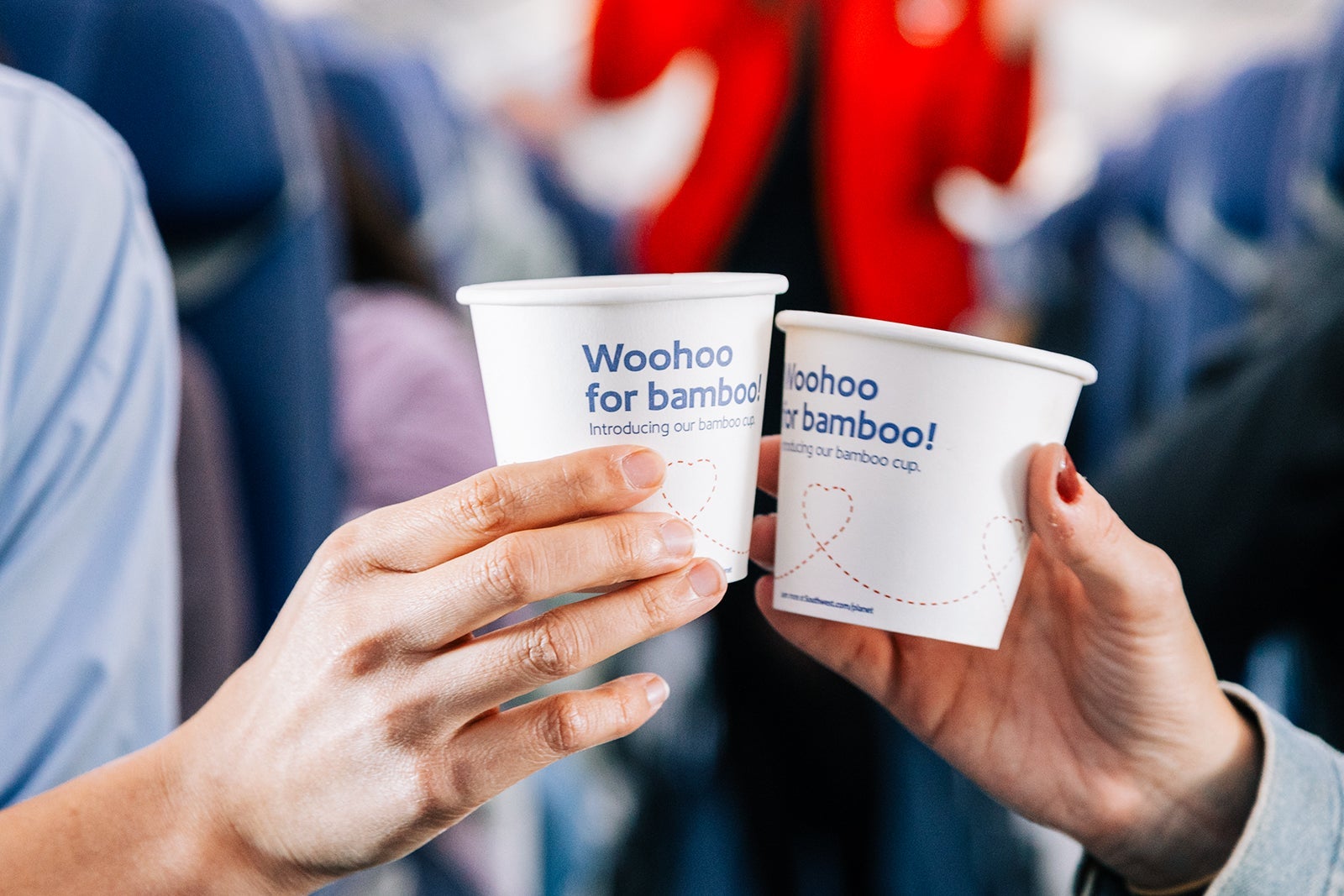 Two people toasting with Southwest cups