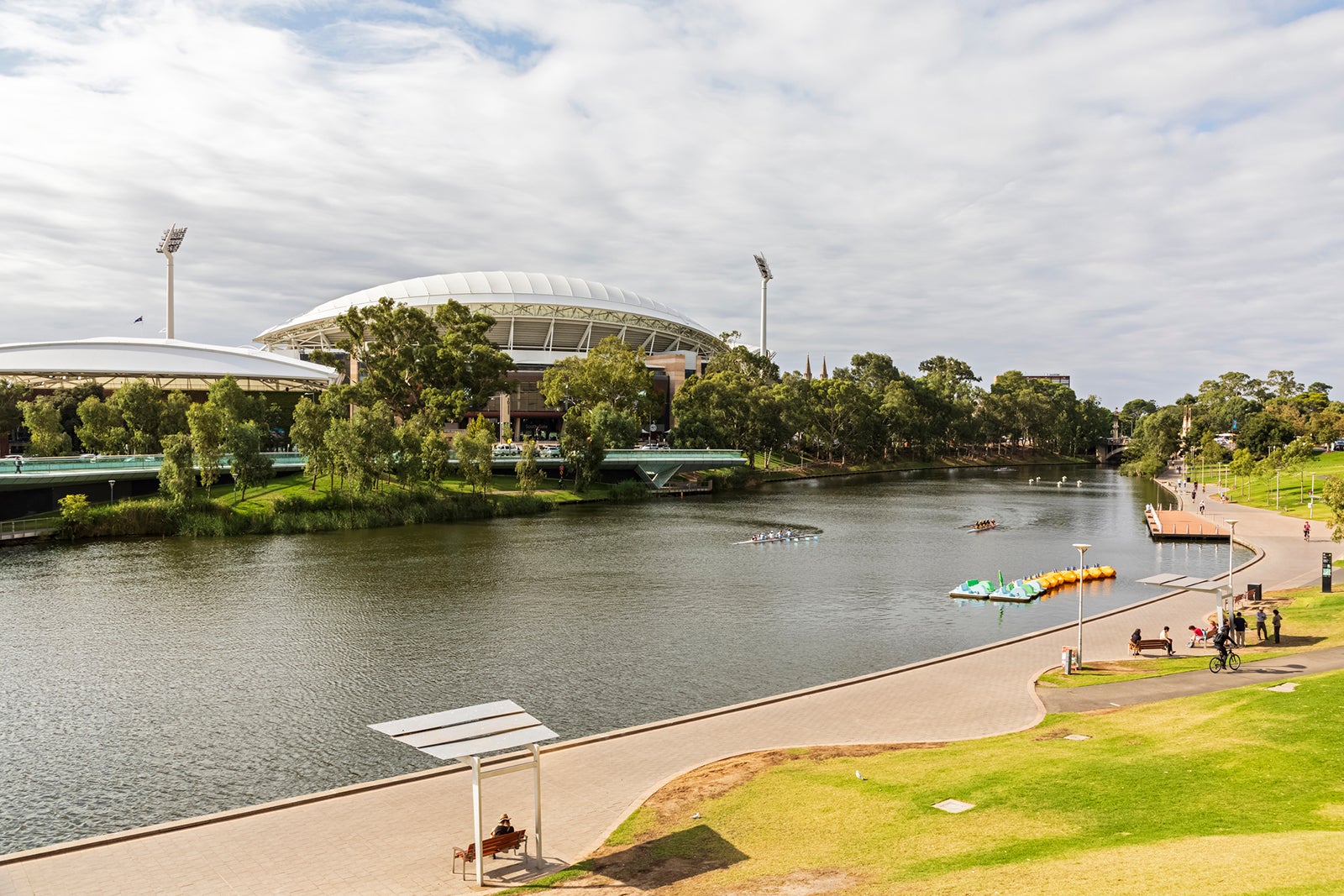 Australia, South Australia, Adelaide, Elder Park riverside promenade with Adelaide Oval in background