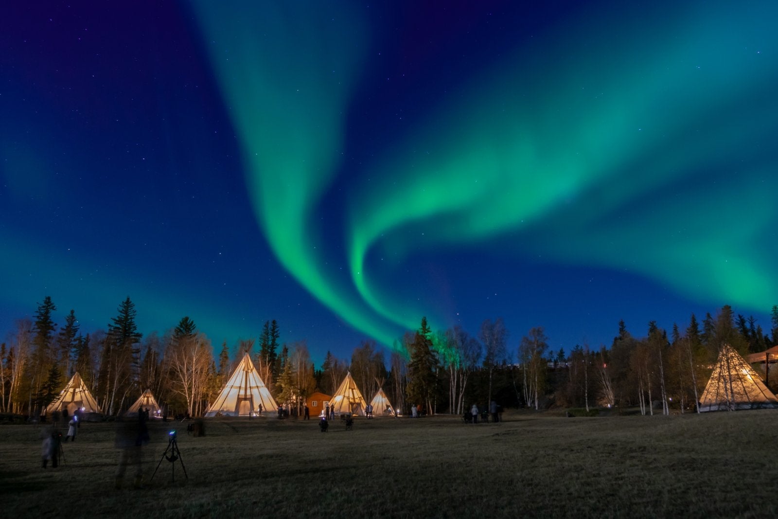YellowKnife,Northwest Territories,Canada : 23 Sep 2018 : Many lightup Tipi with Aurora Borealis at Yellow Knife